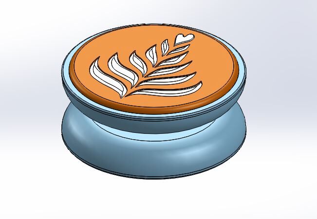 CAD model of blue yoyo with brown coffee and white foam art that looks like leaves.